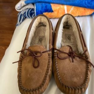 UGG women’s slippers. Priced to sell. Lots of wear left inside. Just scuffed up.